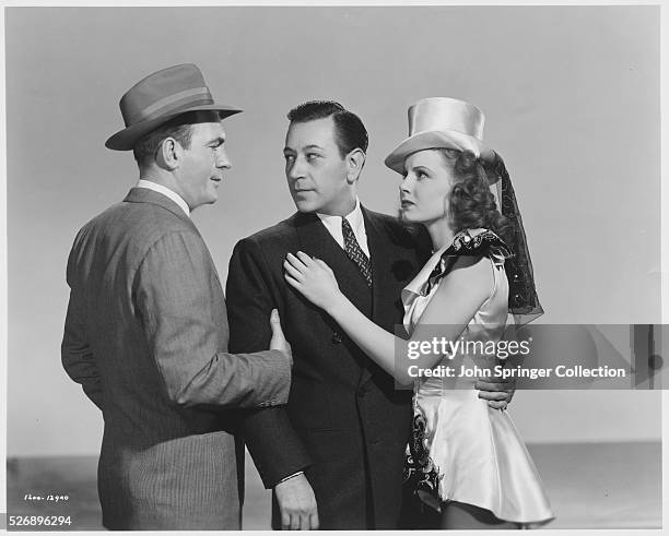 Pat O'Brien as Dan McCorn, George Raft as George and Janet Blair as Billie in the 1942 film Broadway.