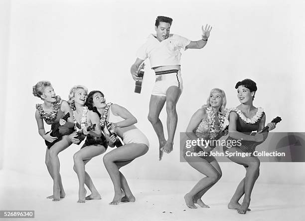 Cast members of Blue Hawaii from left: Pamela Austin as Selena Emerson, Darlene Tompkins as Patsy Simon, Joan Blackman as Maile Duval, Elvis Presley...