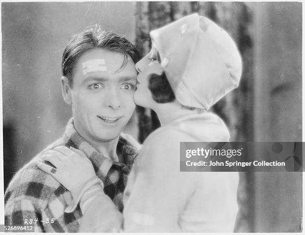 George K. Arthur as Peter Good and Gertrude Olmstead as Any in the 1926 silent film The Boob.