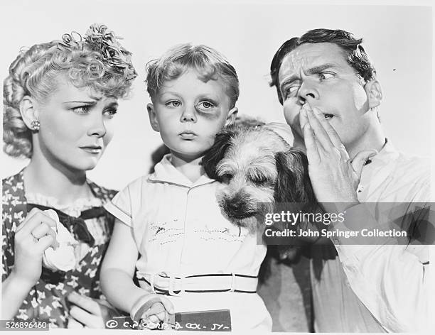 The cast of Blondie Brings Up Baby, from left: Penny Singleton as Blondie Bumstead, Larry Simms as Alexander Bumstead, Spooks the family pet, and...