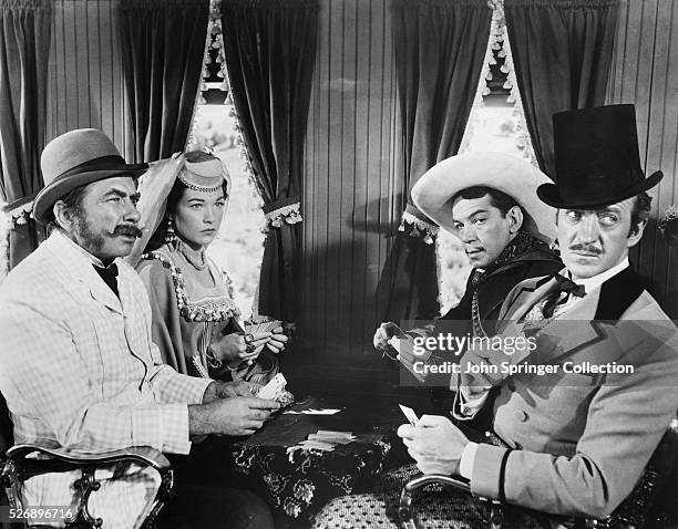 Scene from Around the World in Eighty Days. The film stars : Edmund Lowe, Shirley MacLaine, Cantinflas, and David Niven.