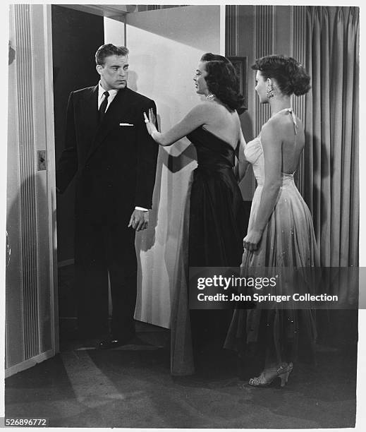 Scott Brady as Robert "Number" Foster and Mitzi Gaynor as Emily Ann Stackerlee in the 1952 musical comedy Bloodhounds of Broadway.