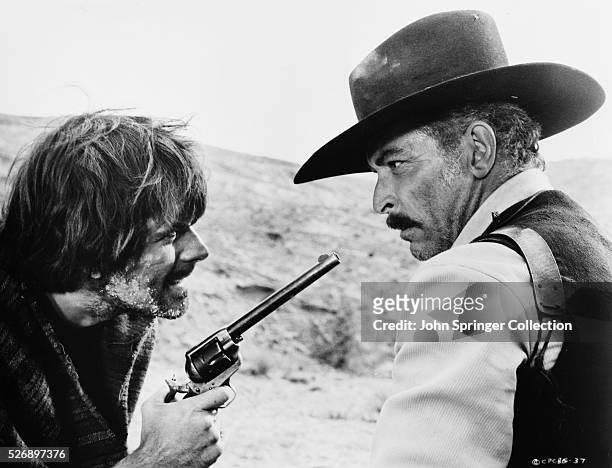 Mexican bandit Cuchillo Sanchez gets the drop on Jonathan Corbett in the 1966 Italian western La Resa dei Conti, titled The Big Gundown when released...