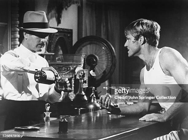 Paul Newman as Henry Gondorff and Robert Redford as Johnny Hooker in the 1973 film The Sting.
