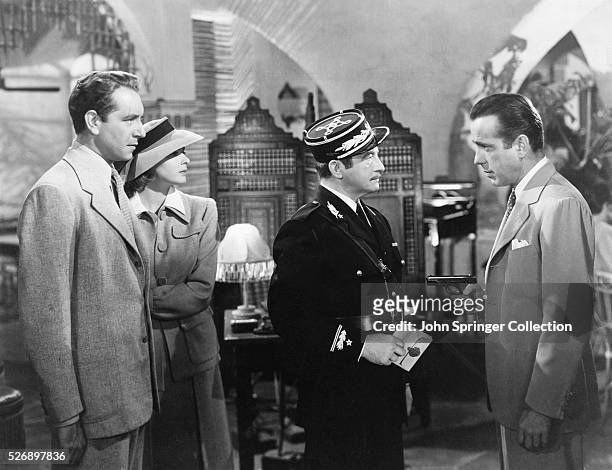 The cast of Casablanca from left to right: Paul Henreid as Victor Laszlo, Ingrid Bergman as Ilsa Lund Laszlo, Claude Rains as Captain Louis Renault,...