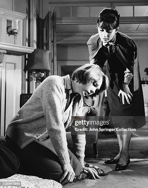 Shirley MacLaine as Martha Dobie and Audrey Hepburn as Karen Wright in The Children's Hour .