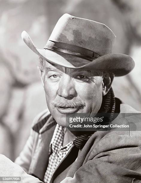 Publicity handout of actor Ward Bond in western gear. Head and shoulders photograph circa 1950s.