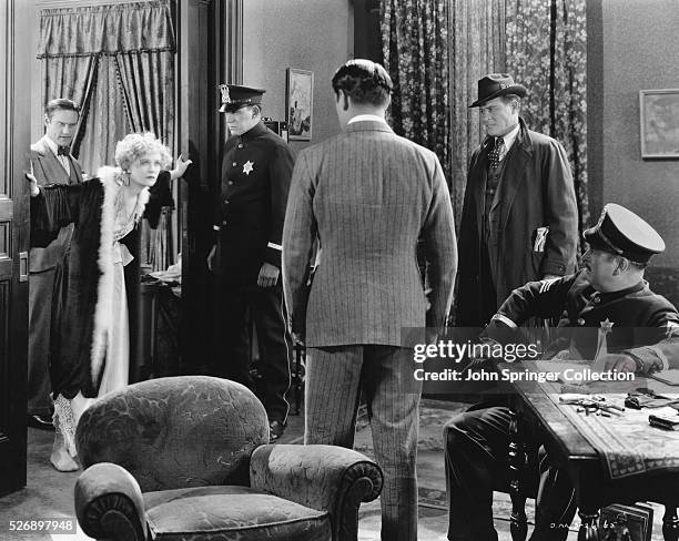 Roxie Hart shouts at her husband Amos Hart during a scene from Chicago .