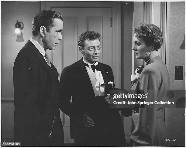 Humphrey Bogart, Peter Lorre, and Mary Astor in The Maltese Falcon. Motion pictured released in 1941.