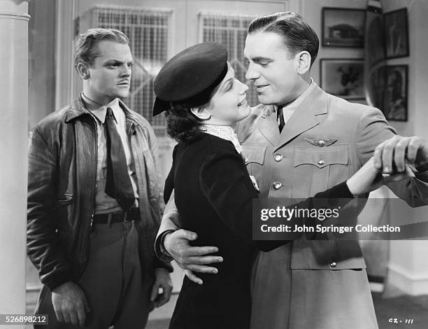 James Cagney as Dizzy Davis, June Travis as Tommy Thomas and Pat O'Brien Jake L. Lee, in the 1936 film Ceiling Zero.