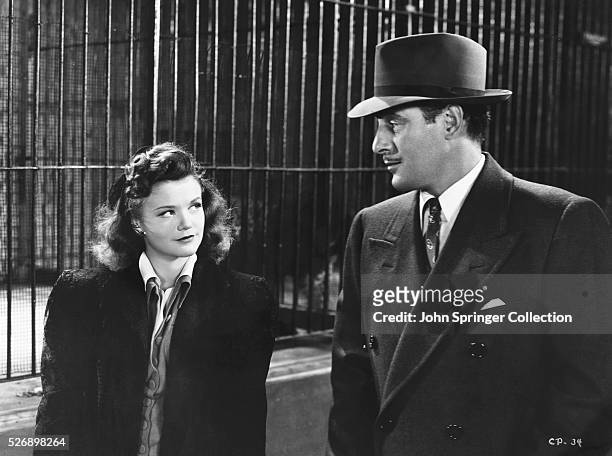 Simone Simon as Irena Dubrovna and Tom Conway as Louis Judd in the 1942 film Cat People.
