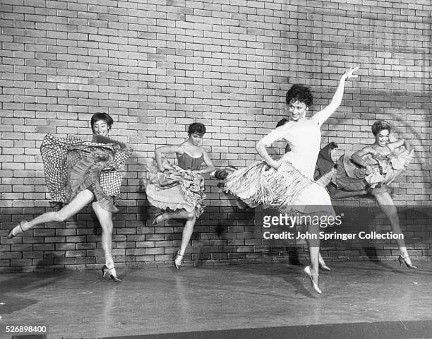 Scene from the Broadway musical "West Side Story," L-R: Lynn Ross, unnamed actress, Chita Rivera, and Carmen Guitterez. Undated photo.