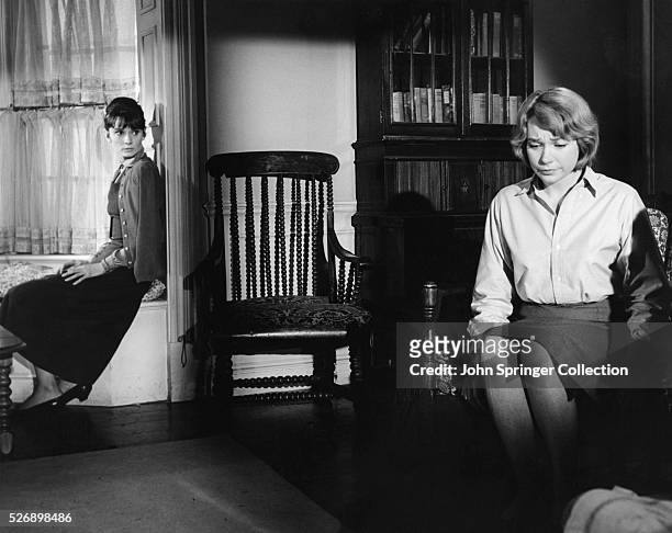 Audrey Hepburn as Karen Wright and Shirley MacLaine as Martha Dobie in The Children's Hour .