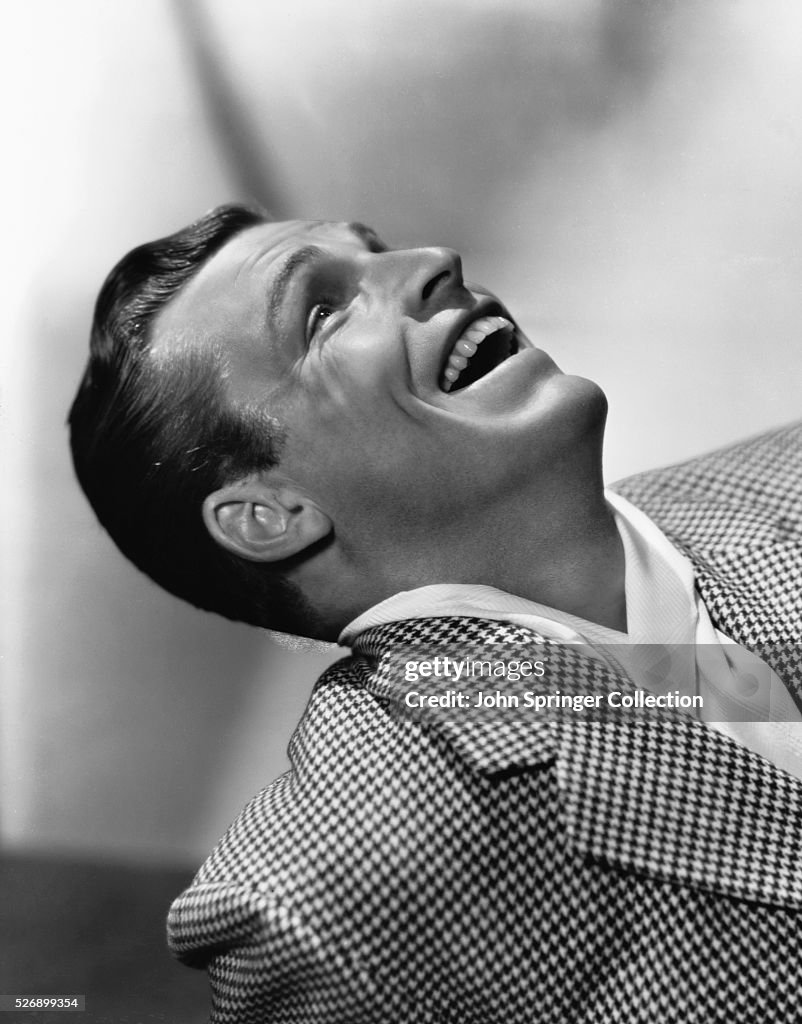 Actor Buster Crabbe Laughing