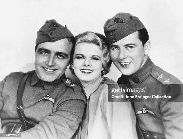 James Hall plays Roy Rutledge, Jean Harlow plays Helen and Ben Lyon plays Monte Rutledge in the 1930 film Hell's Angels.