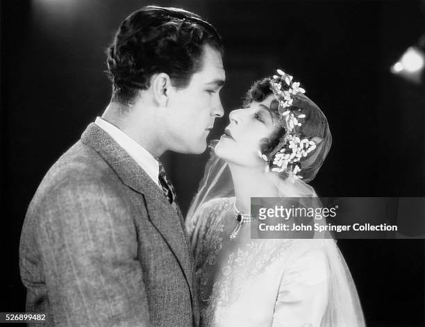 Movie still from the film, "My Man" with Fannie Brice and Guinn "Big Boy" Williams.Miss Brice is wearing what appears to be a wedding veil. Warner...