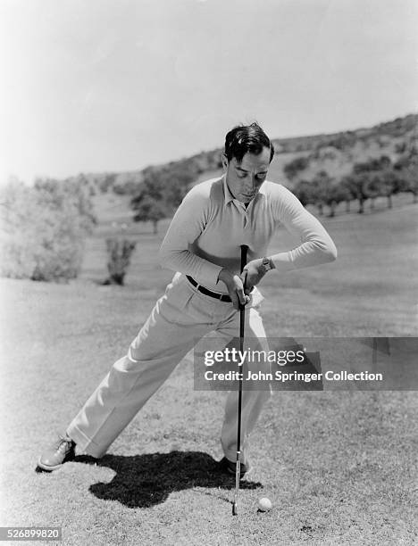 Form in Putting demonstrated by Buster Keaton, Metro-Goldwyn-Mayer star. Undated photograph.