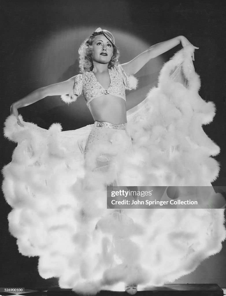 Actress Lillian Harvey in White Dress