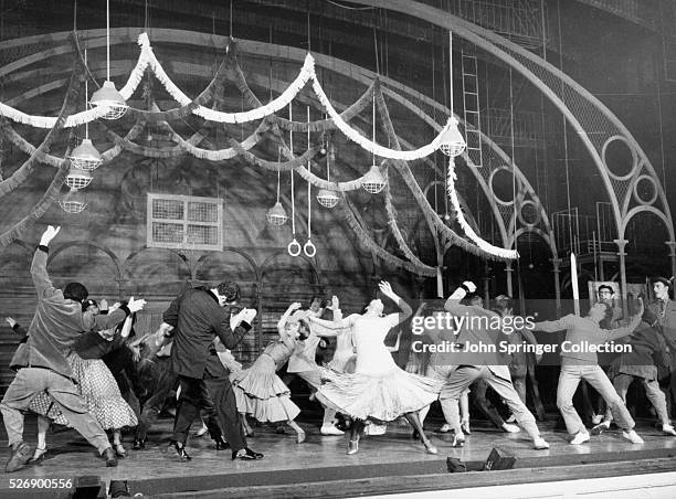 Theater still from the 1957 Broadway production of "West Side Story," directed by Jerome Robbins. This scene shows the high school dance.