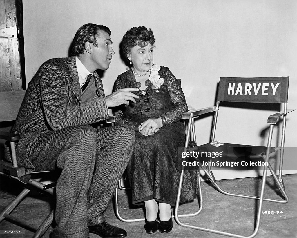 James Stewart pointing out Harvey, the invisible white rabbit, to ...