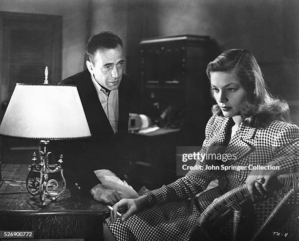 Humphrey Bogart as Harry "Steve" Morgan and Lauren Bacall as Marie Browning in To Have and Have Not. | Version of: 'To Have and Have Not' by Ernest...