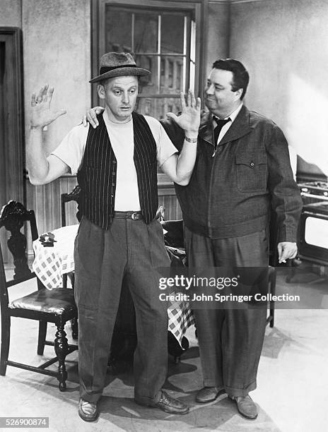 Scene from the 1950s sitcom classic, "The Honeymooners," featuring Jackie Gleason and Art Carney. Ca. 1950s.