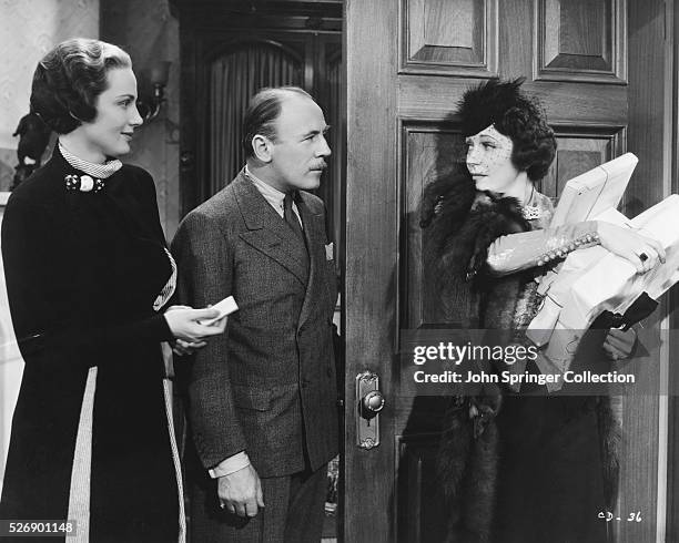 Frieda Inescort as Dorothy Hilton, Roland Young as Frank Haines, and Alice Brady as Muriel West in the 1937 film Call It a Day.