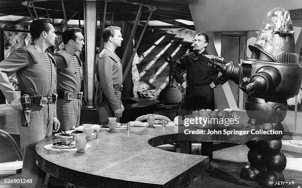 Warren Stevens as Lieutenant Doc Ostrow, Jack Kelly as Lieutenant Jerry Farman, Leslie Nielsen as Commander John J. Adams, Walter Pidgeon as Dr....