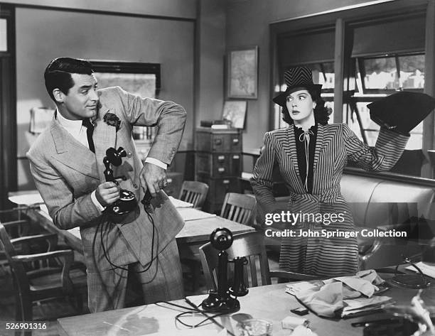 Rosalind Russell seems to have had just about enough of her boss Cary Grant in this movie still from "His Girl Friday."