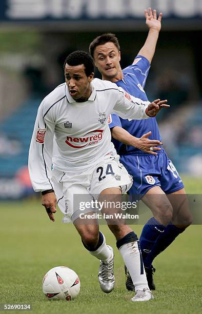 Tyrone Mears of Preston Myers evades Dennis Wise of MIllwall during the Coca-Cola Championship match between Millwall and Preston North End held at...