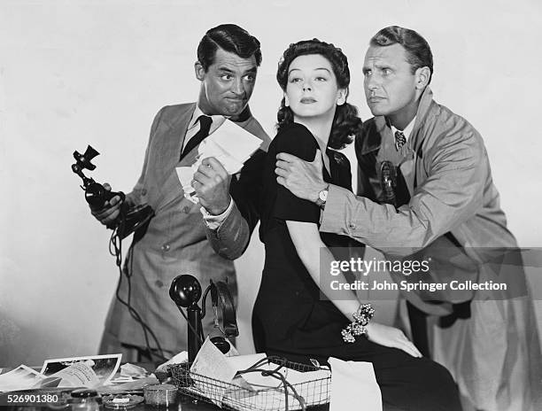 Cary Grant, Rosalind Russell, and Ralph Bellamy in a publicity still for His Girl Friday.