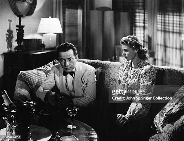 Movie still from the 1942 classic, "Casablanca." In this scene, Humphrey Bogart and Ingrid Bergman reminisce about Paris on a couch.