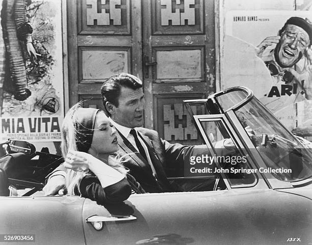 Brigitte Bardot as Camille Javal and Jack Palance as Jeremy Prokosch in Contempt.