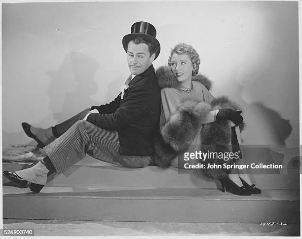 Brian Donlevy and Muriel Angelus as Dan and Catherine McGinty, in The Great McGinty