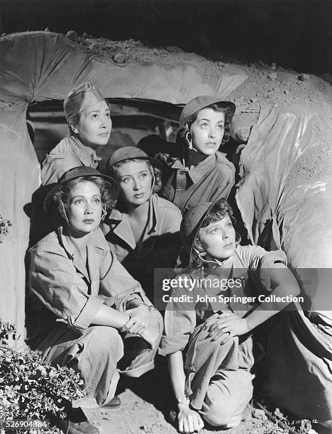 Ann Sothern, Fay Bainter, Joan Blondell, Margaret Sullivan, and Marsha Hunt as nurses in the war film Cry Havoc.