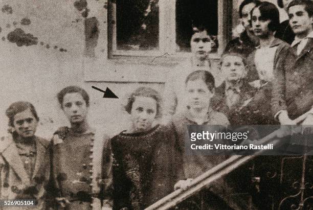The young Albanian born Anjez�� Gonxhe Bojaxhiu, future Mother Teresa of Calcutta, surrounded by her classmates.