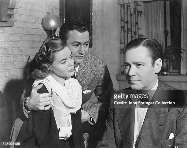 Dorothy McGuire as Laura Pennington, Robert Young as Oliver Bradford, and Herbert Marshall as the blind composer in the 1945 film The Enchanted...
