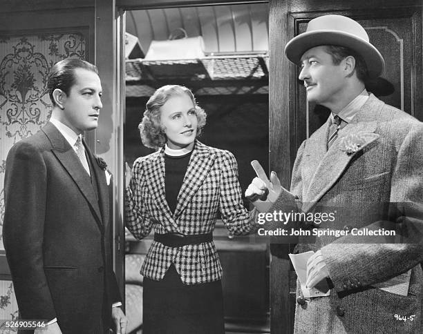 Edmund Lowe as Kenneth Stevens and Madge Evans as Patricia Booth in the 1937 film Espionage.