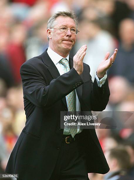 Alex Ferguson, the manager of Manchester United claps the fans after the Barclays Premiership match between Manchester United and Newcastle United at...