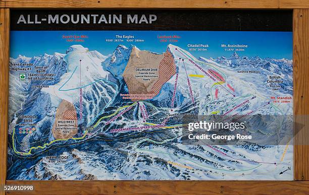 Detailed mountain map of the Sunshine Village ski resort is viewed on April 26, 2016 near Banff Springs, Alberta, Canada. Banff is Canada's oldest...