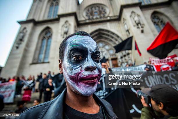 Anarchists, punks and skinheads protest on Saturday in downtown Sao Paulo in Brazil against the current political system in the country. They are...