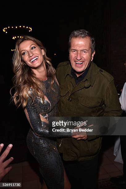 Gisele Bundchen and photographer Mario Testino attend the Gisele Bundchen Spring Fling book launch on April 30, 2016 in New York City.