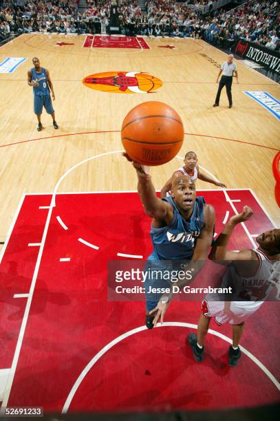 Brendan Haywood of the Washington Wizards puts up a shot over Othella Harrington of the Chicago Bulls in Game one of the Western Conference...