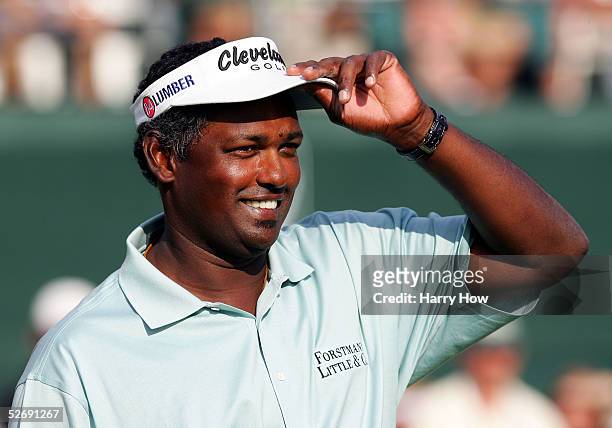 Vijay Singh of Fiji smiles on the 18th green in reaction to a one shot victory over John Daly in a one hole playoff during the final round of the...
