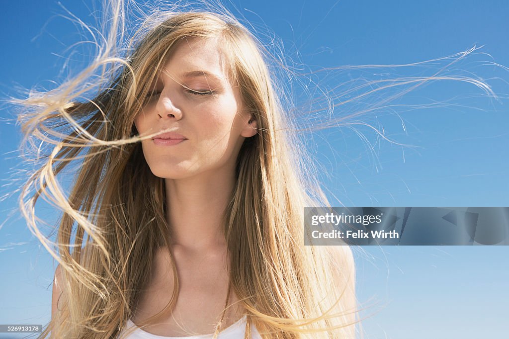 Wind blowing through woman's hair