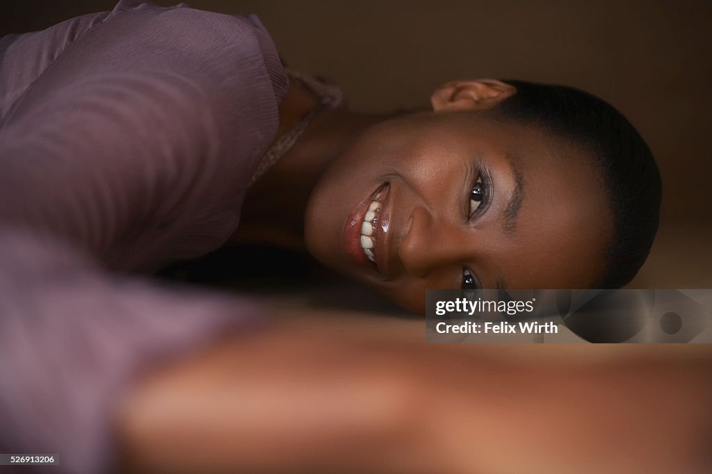 Woman lying down and smiling