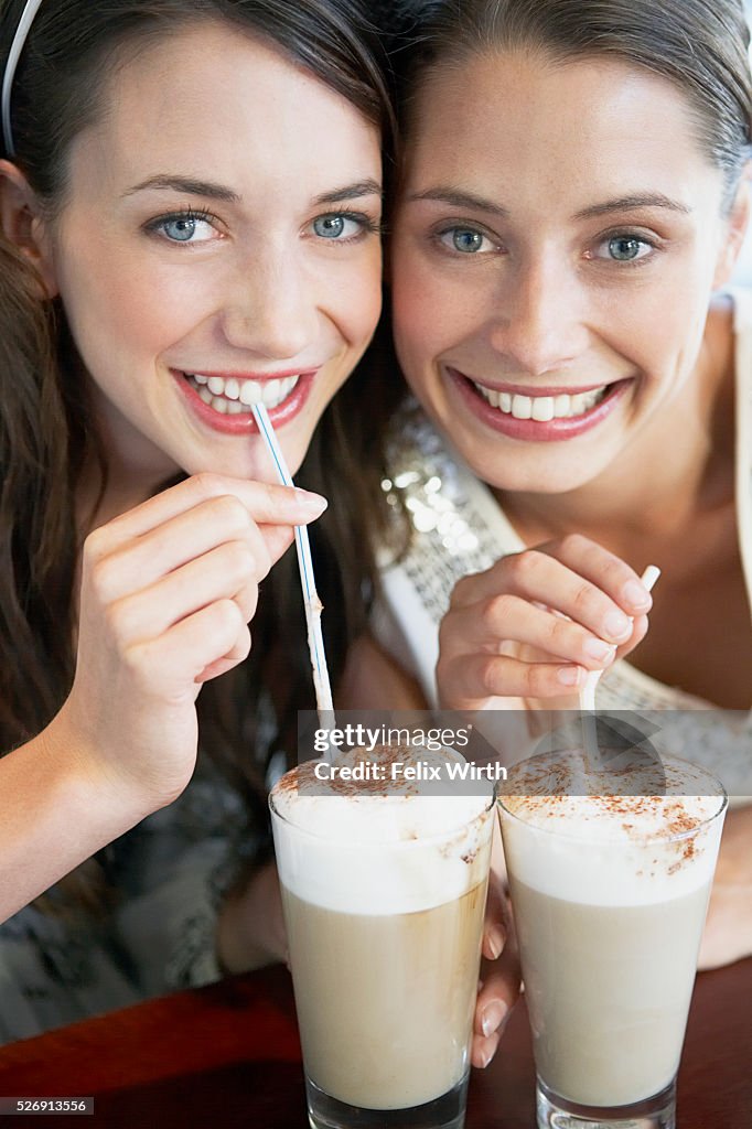 Women enjoying coffee drinks