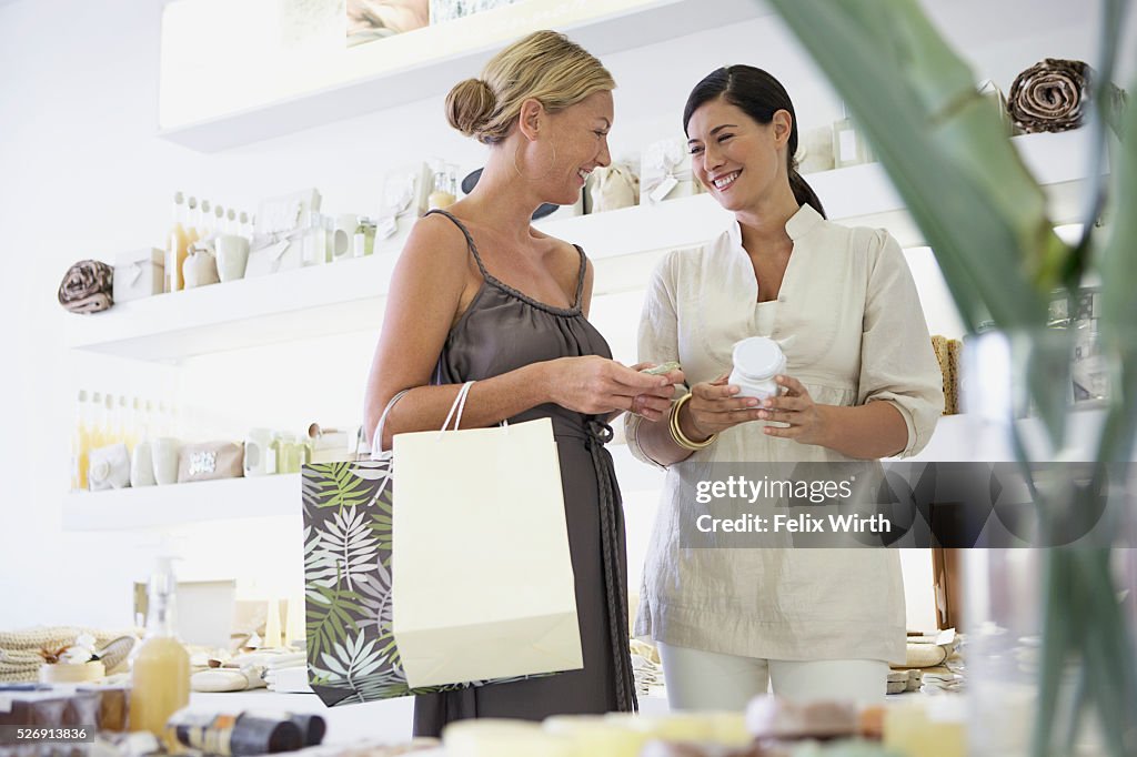 Customer and saleswoman