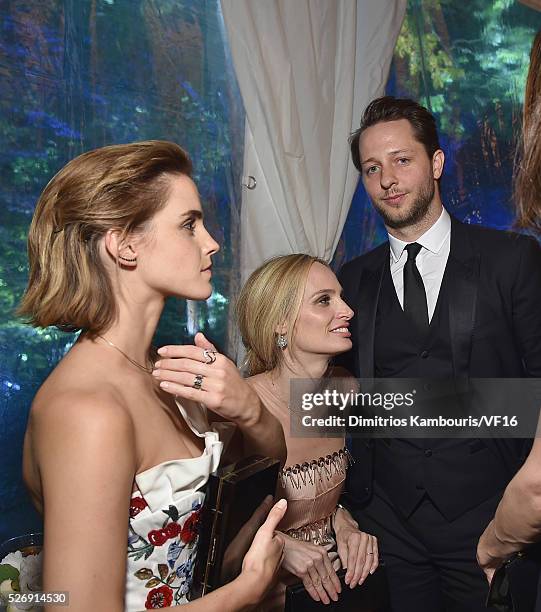 Emma Watson, Lauren Santo Domingo and Derek Blasberg attend the Bloomberg & Vanity Fair cocktail reception following the 2015 WHCA Dinner at the...