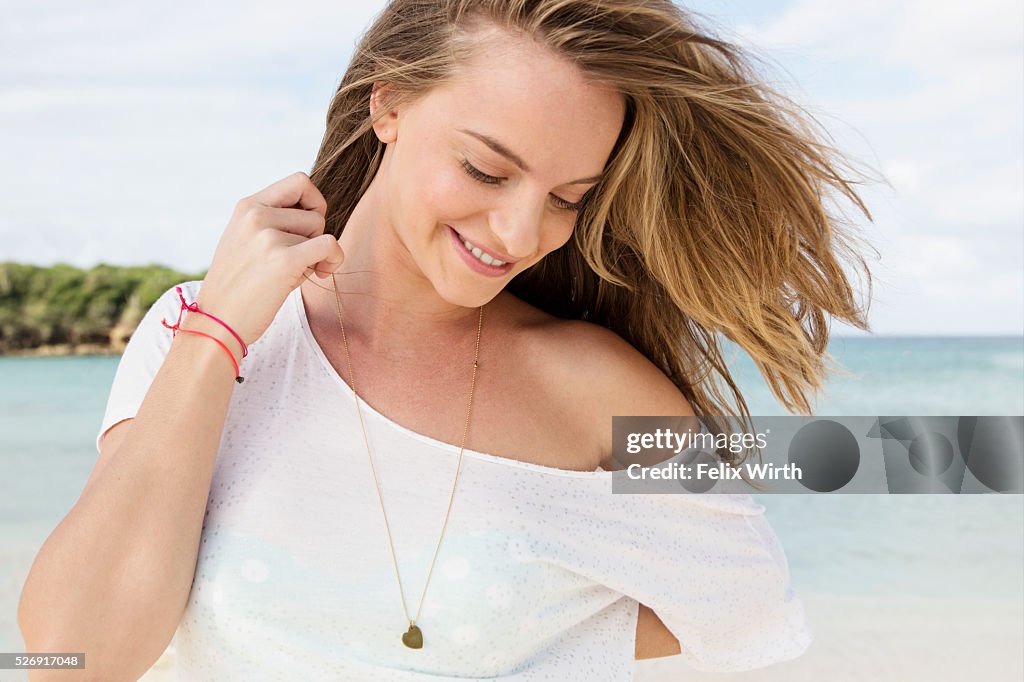 Portrait of young woman on beach